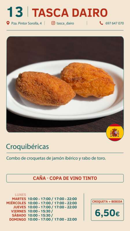 Two golden fried croquettes on a white plate, served on a dark wooden table, representing the Croquibéricas dish on Tasca Dairo's menu.