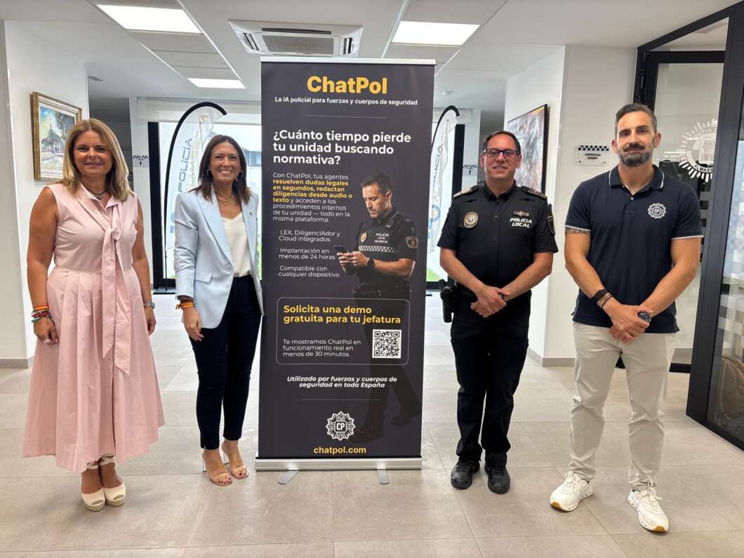 Four adults stand in a hallway beside a ChatPol promotional banner, with two women on the left and two men on the right in a lobby setting.